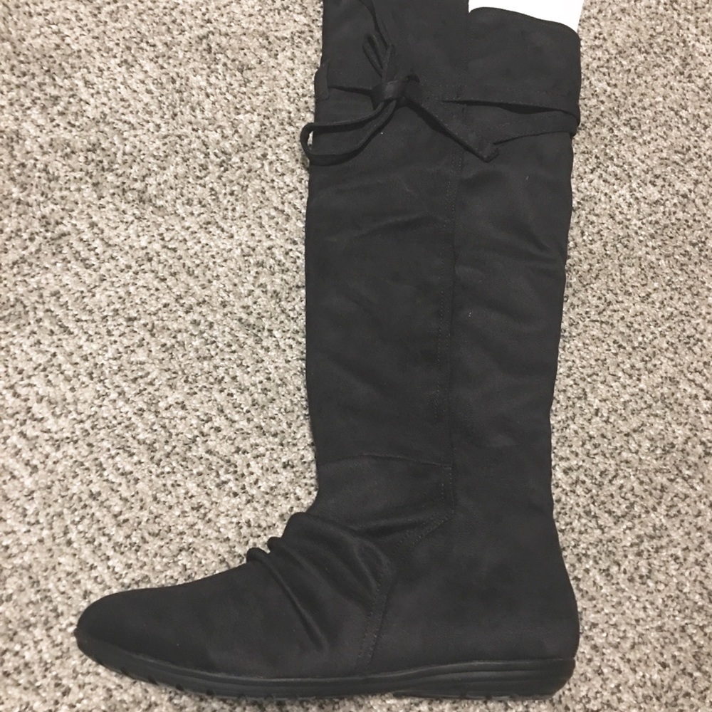 Knee high boots.  Suede.